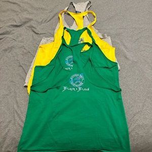Black and Blue stringer tank tops size L. Have green, yellow, grey. Never worn